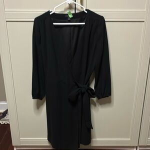 J Crew wrap dress in black. Great for parties or professional wear.